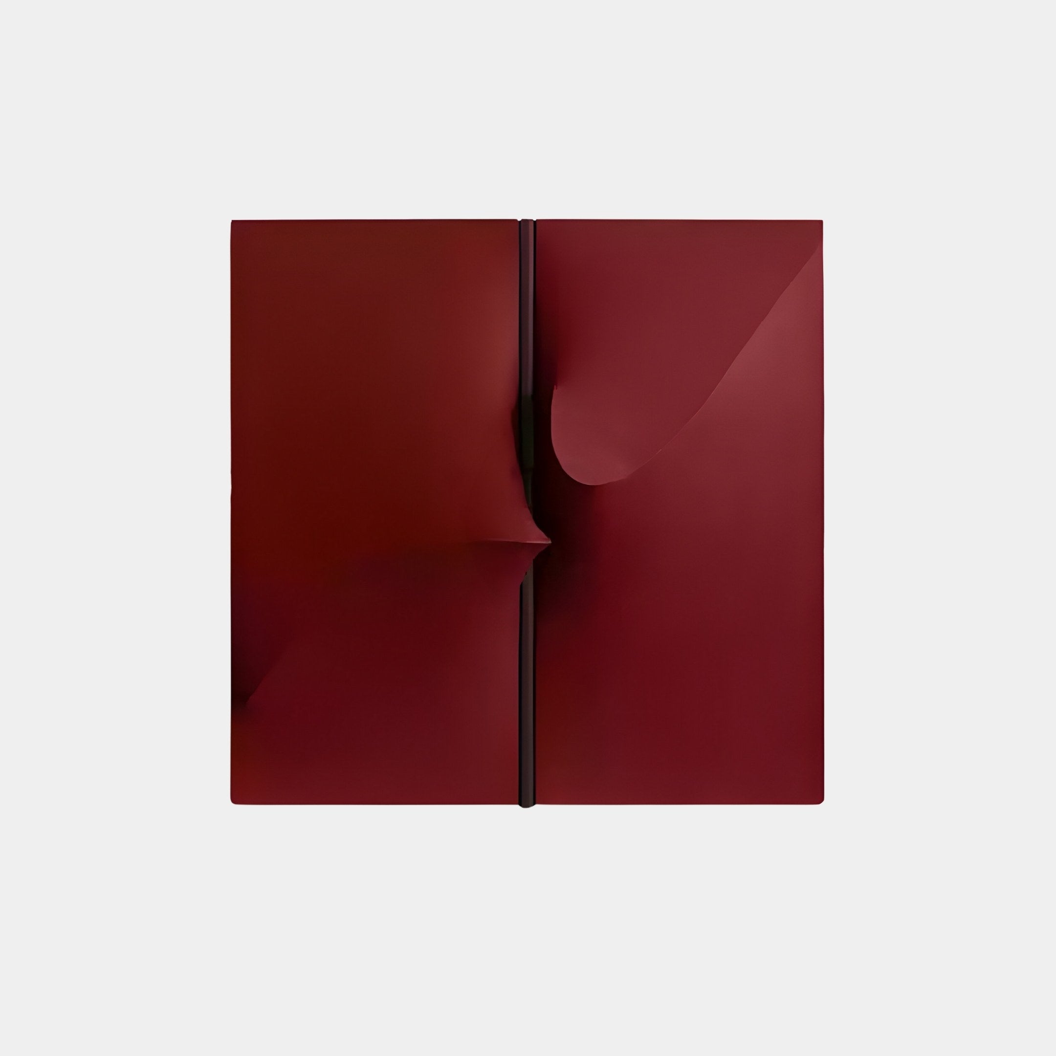 The Delinea Crimson Red Wall Art by Giant Sculptures features a modern geometric design with folded, curved elements on a white background, highlighting sharp lines and smooth 3D wood relief for an abstract, minimalist look.