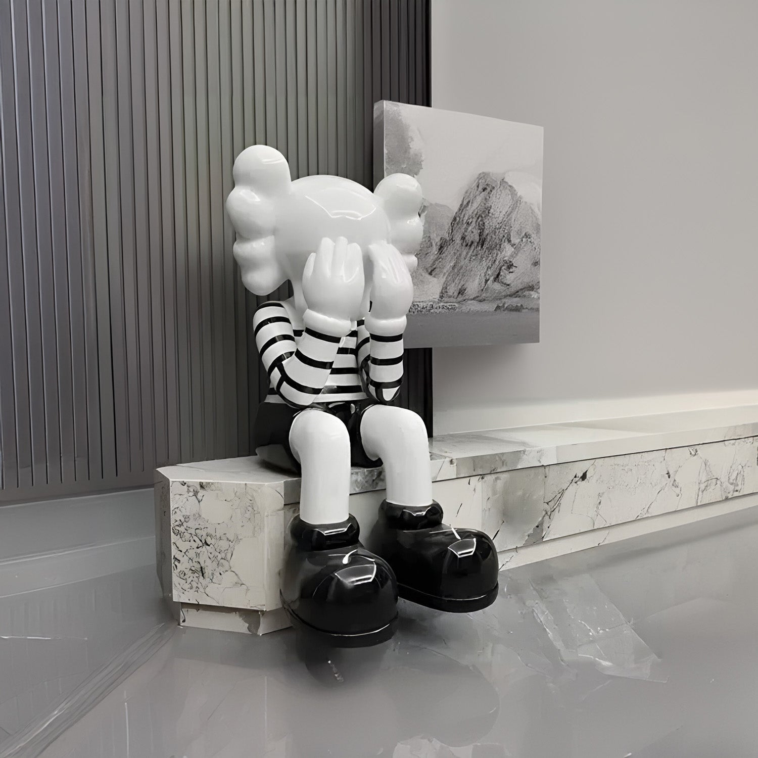 Mime Iconify Sitting Sculpture in a contemporary space, artistic and imaginative decor.