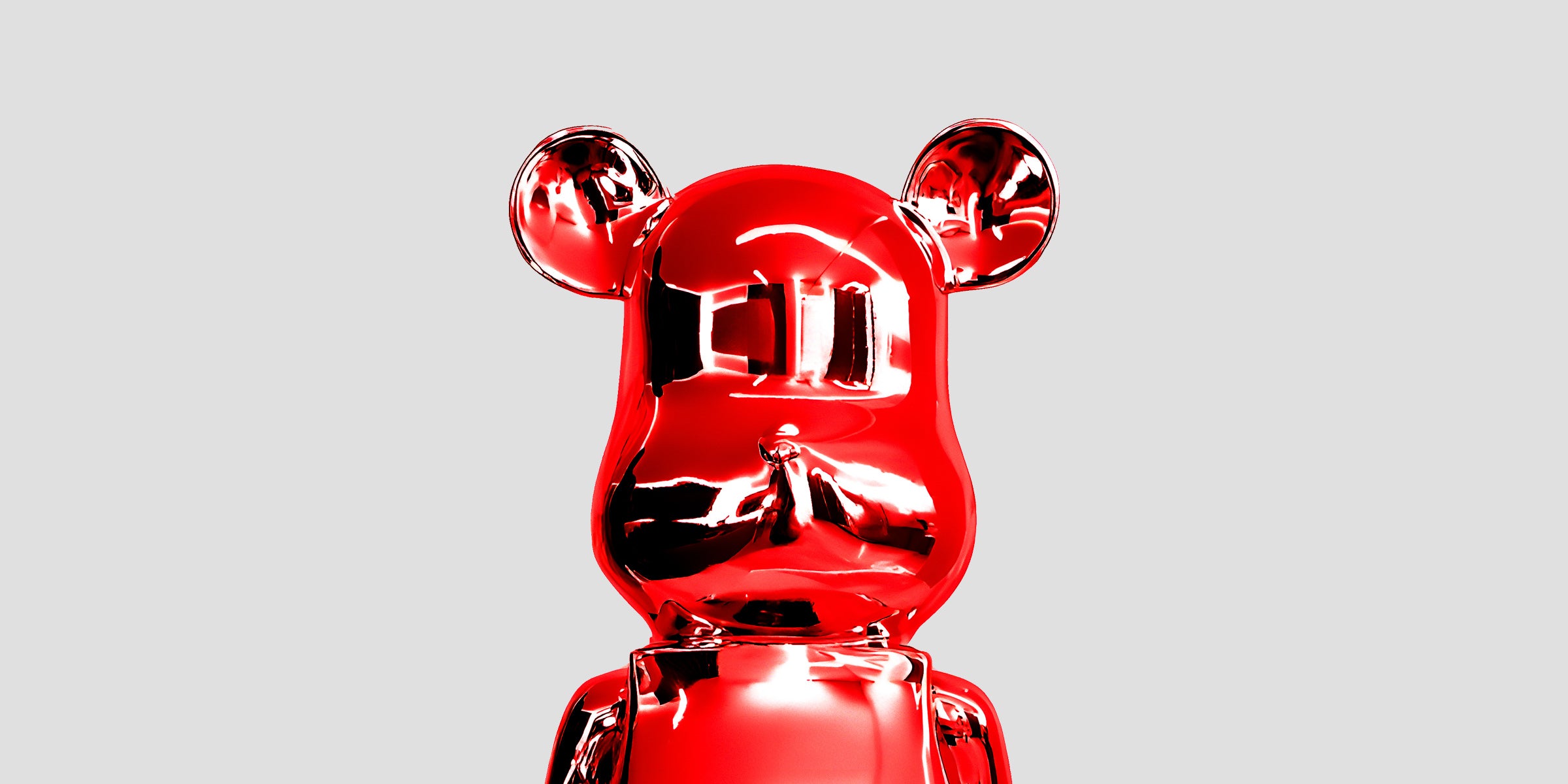 Close-up of a glossy ruby red luxury bear sculpture with reflective finish, modern art decor.